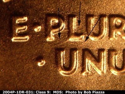 Die-stage B marker on 2004P•1DR•031 (2004 Doubled Die Reverse).