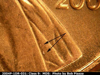 Die-stage B marker on 2004P•1DR•031 (2004 Doubled Die Reverse).