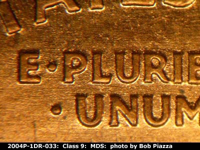 Die-stage B marker on 2004P•1DR•033 (2004 Doubled Die Reverse).