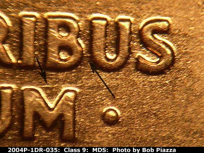 Die-stage B marker on 2004P•1DR•035 (2004 Doubled Die Reverse).