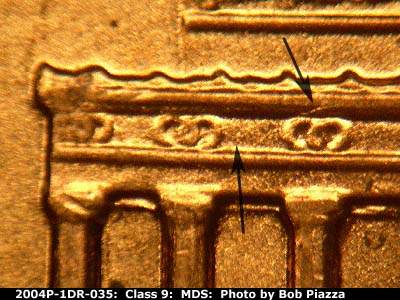 Die-stage B marker on 2004P•1DR•035 (2004 Doubled Die Reverse).