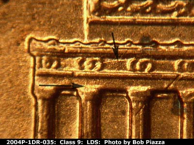 Die-stage C marker on 2004P•1DR•035 (2004 Doubled Die Reverse).