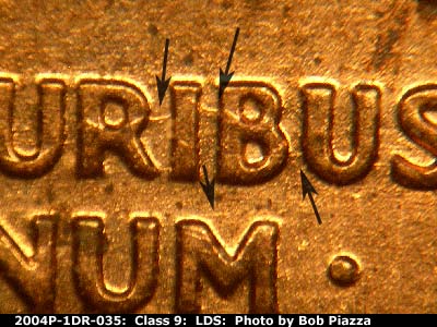 Die-stage C marker on 2004P•1DR•035 (2004 Doubled Die Reverse).
