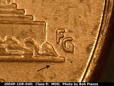 Die-stage B marker on 2004P•1DR•040 (2004 Doubled Die Reverse).