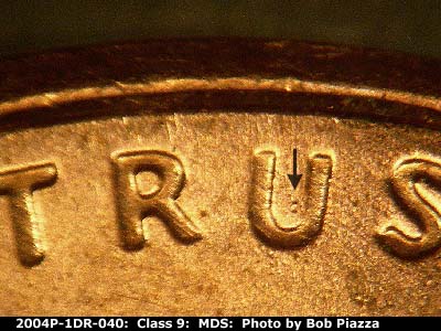 Die-stage B marker on 2004P•1DR•040 (2004 Doubled Die Reverse).