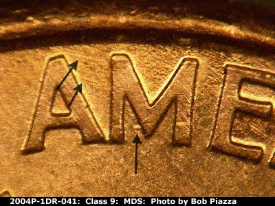 Die-stage B marker on 2004P•1DR•041 (2004 Doubled Die Reverse).