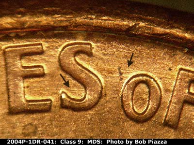 Die-stage B marker on 2004P•1DR•041 (2004 Doubled Die Reverse).