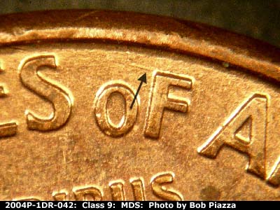 Die-stage B marker on 2004P•1DR•042 (2004 Doubled Die Reverse).