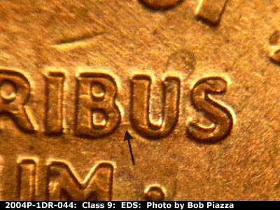 Die-stage A marker on 2004P•1DR•044 (2004 Doubled Die Reverse).