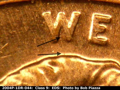 Die-stage A marker on 2004P•1DR•044 (2004 Doubled Die Reverse).