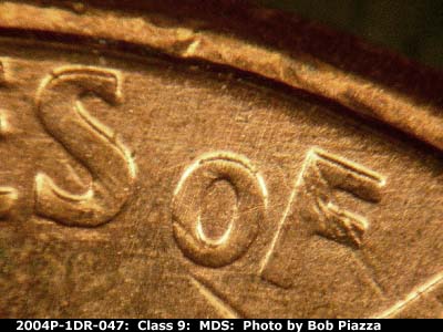 Die-stage B marker on 2004P•1DR•047 (2004 Doubled Die Reverse).