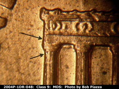 Die-stage B marker on 2004P•1DR•048 (2004 Doubled Die Reverse).