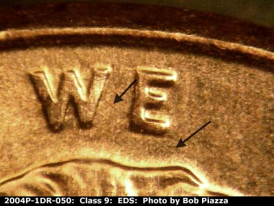 Die-stage A marker on 2004P•1DR•050 (2004 Doubled Die Reverse).