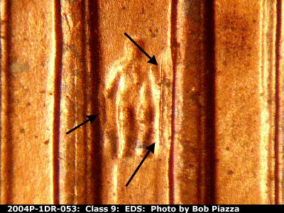 Die-stage A marker on 2004P•1DR•053 (2004 Doubled Die Reverse).