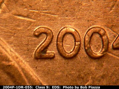 Die-stage A marker on 2004P•1DR•055 (2004 Doubled Die Reverse).