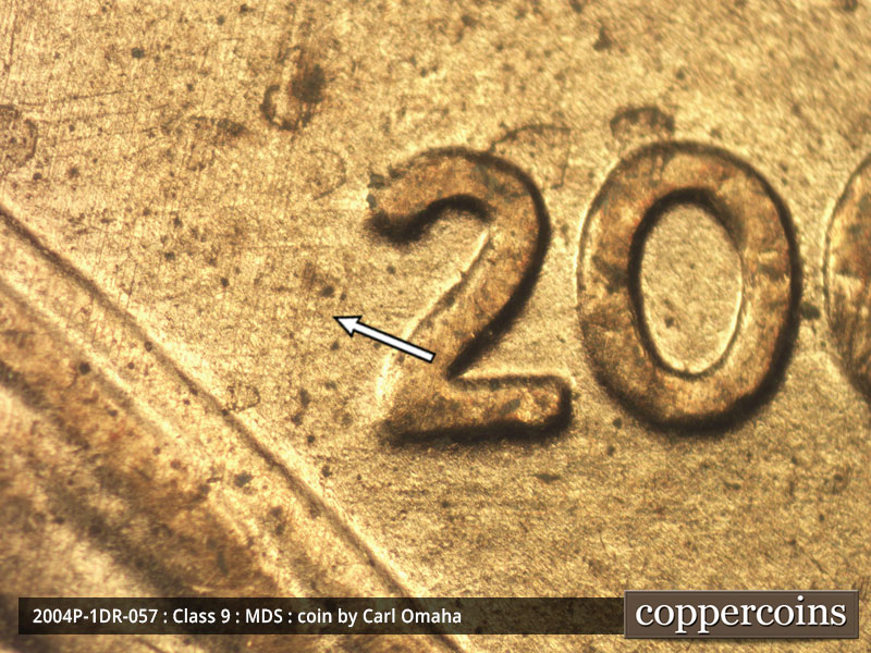 Die-stage B marker on 2004P•1DR•057 (2004 Doubled Die Reverse).