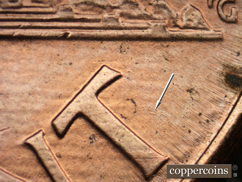 Die-stage B marker on 2005P•1DR•002 (2005 Doubled Die Reverse).