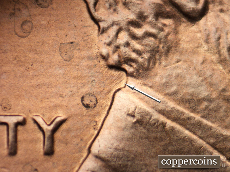 Die-stage B marker on 2005P•1DR•002 (2005 Doubled Die Reverse).