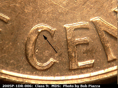Die-stage B marker on 2005P•1DR•006 (2005 Doubled Die Reverse).