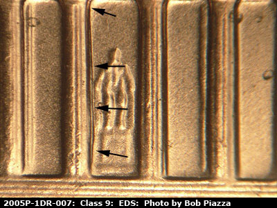 Die-stage A marker on 2005P•1DR•007 (2005 Doubled Die Reverse).