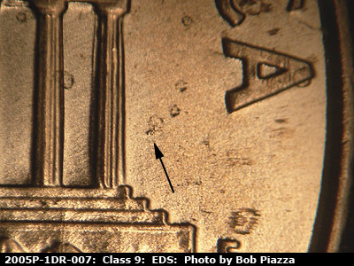 Die-stage A marker on 2005P•1DR•007 (2005 Doubled Die Reverse).