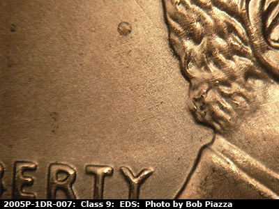 Die-stage A marker on 2005P•1DR•007 (2005 Doubled Die Reverse).