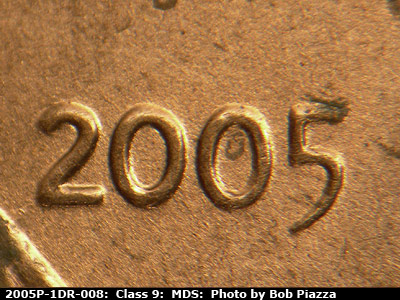 Die-stage B marker on 2005P•1DR•008 (2005 Doubled Die Reverse).