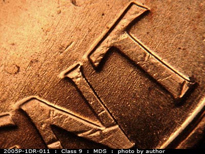 Die-stage B marker on 2005P•1DR•011 (2005 Doubled Die Reverse).