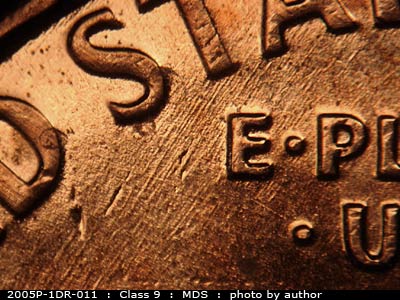 Die-stage B marker on 2005P•1DR•011 (2005 Doubled Die Reverse).