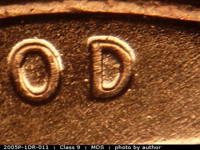 Die-stage B marker on 2005P•1DR•011 (2005 Doubled Die Reverse).