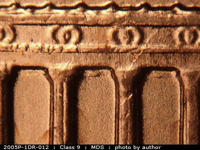 Die-stage B marker on 2005P•1DR•012 (2005 Doubled Die Reverse).