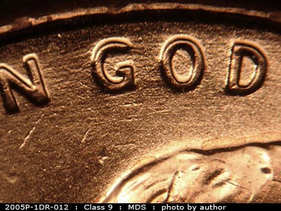 Die-stage B marker on 2005P•1DR•012 (2005 Doubled Die Reverse).