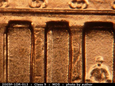 Die-stage B marker on 2005P•1DR•013 (2005 Doubled Die Reverse).