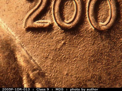 Die-stage B marker on 2005P•1DR•013 (2005 Doubled Die Reverse).