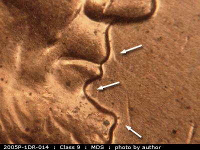 Die-stage B marker on 2005P•1DR•014 (2005 Doubled Die Reverse).