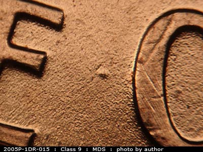 Die-stage B marker on 2005P•1DR•015 (2005 Doubled Die Reverse).