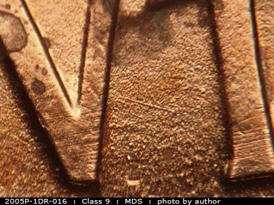 Die-stage B marker on 2005P•1DR•016 (2005 Doubled Die Reverse).