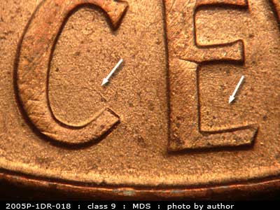 Die-stage B marker on 2005P•1DR•018 (2005 Doubled Die Reverse).