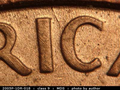 Die-stage B marker on 2005P•1DR•018 (2005 Doubled Die Reverse).