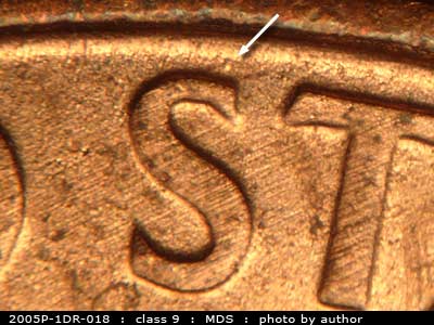 Die-stage B marker on 2005P•1DR•018 (2005 Doubled Die Reverse).