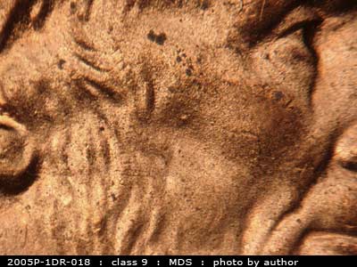 Die-stage B marker on 2005P•1DR•018 (2005 Doubled Die Reverse).