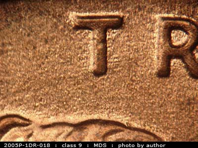 Die-stage B marker on 2005P•1DR•018 (2005 Doubled Die Reverse).