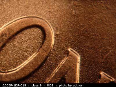Die-stage B marker on 2005P•1DR•019 (2005 Doubled Die Reverse).