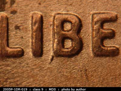 Die-stage B marker on 2005P•1DR•019 (2005 Doubled Die Reverse).