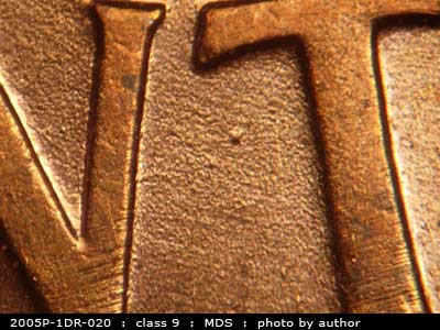 Die-stage B marker on 2005P•1DR•020 (2005 Doubled Die Reverse).