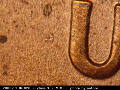 Die-stage B marker on 2005P•1DR•020 (2005 Doubled Die Reverse).