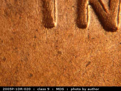 Die-stage B marker on 2005P•1DR•020 (2005 Doubled Die Reverse).