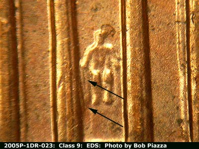 Die-stage A marker on 2005P•1DR•023 (2005 Doubled Die Reverse).