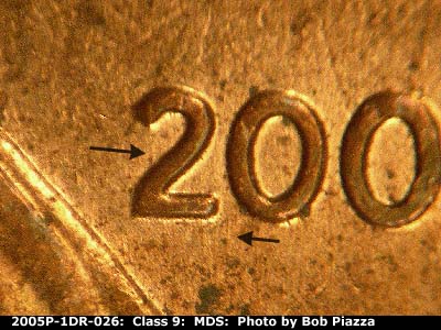 Die-stage B marker on 2005P•1DR•026 (2005 Doubled Die Reverse).