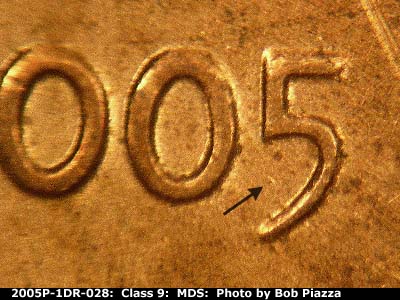 Die-stage B marker on 2005P•1DR•028 (2005 Doubled Die Reverse).